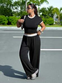 Muchica Bộ 2 món cỡ lớn gồm áo tay ngắn cổ tròn viền tương phản và quần cạp chun. - Đen và trắng - Xem 3