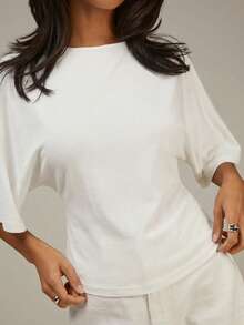 Athîral Blusa casual de mujer de unicolor con cuello redondo, mangas tipo murciélago y detalle de nudo en la espalda - Blanco - Ver 5