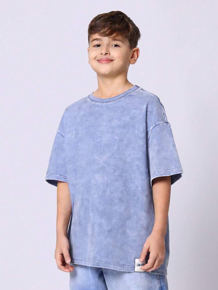 Duża koszulka z efektem sprania i grafiką na plecach