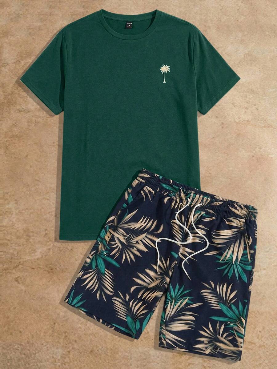 HIMLAND Conjunto casual de playa de vacaciones para hombres con camiseta de manga corta con estampado de palmeras tropicales y pantalones cortos con cordón en la cintura, conjunto de pantalones cortos de verano para vacaciones de hombres, conjunto de ropa de playa para hombres, conjunto de 2 piezas tropical para hombres, conjunto de pantalones cortos para hombre de Hawái - Verde - Ver 1