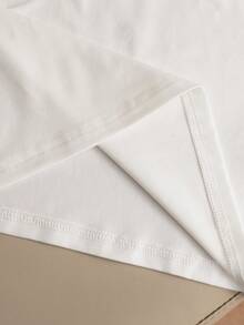 GlowEve Top sin mangas de punto con cuello polo, bordado y de colores contrastantes - Blanco - Ver 7