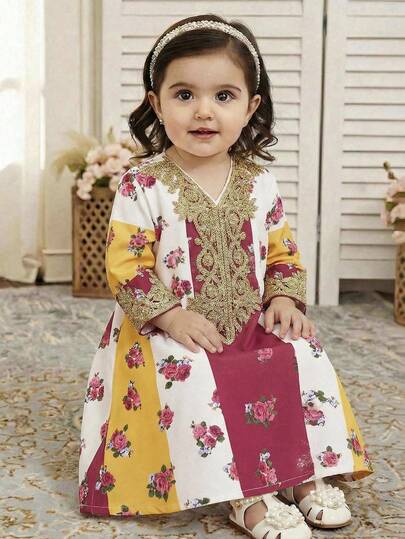 Vestido suelto y elegante para bebé niña con cuello en V, estampado floral y decoración con cinta dorada