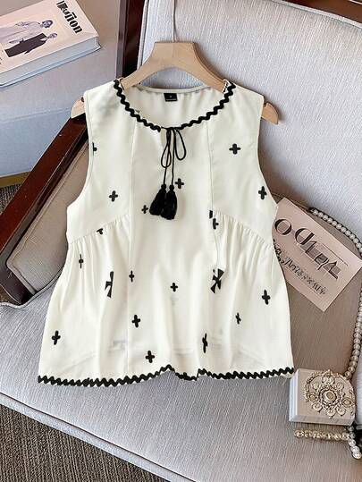 GlowEve Elegant Cross Print Ruffle Hem Sleeveless Blouse