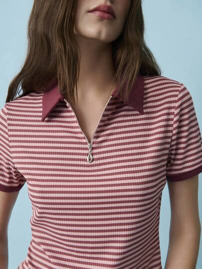 Nöista 修身酒红色条纹Polo衫。领口和袖口采用撞色设计，前拉链开合。适合春夏穿着，休闲百搭。