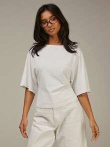 Athîral Blusa casual de mujer de unicolor con cuello redondo, mangas tipo murciélago y detalle de nudo en la espalda - Blanco - Ver 2
