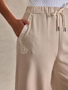 EURMUSE Women Solid Color Embroidery Detailed Wide Leg Sweatpants - Beige - View 3