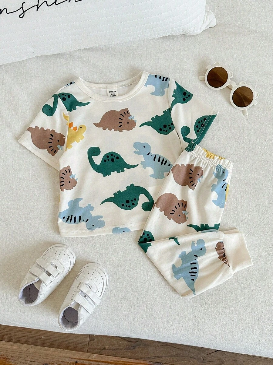 SHEIN 2件套男女童可爱恐龙印花短袖T恤和裤子休闲家居服套装,适合室内外穿着,春夏款 - 杏色 - 查看 1