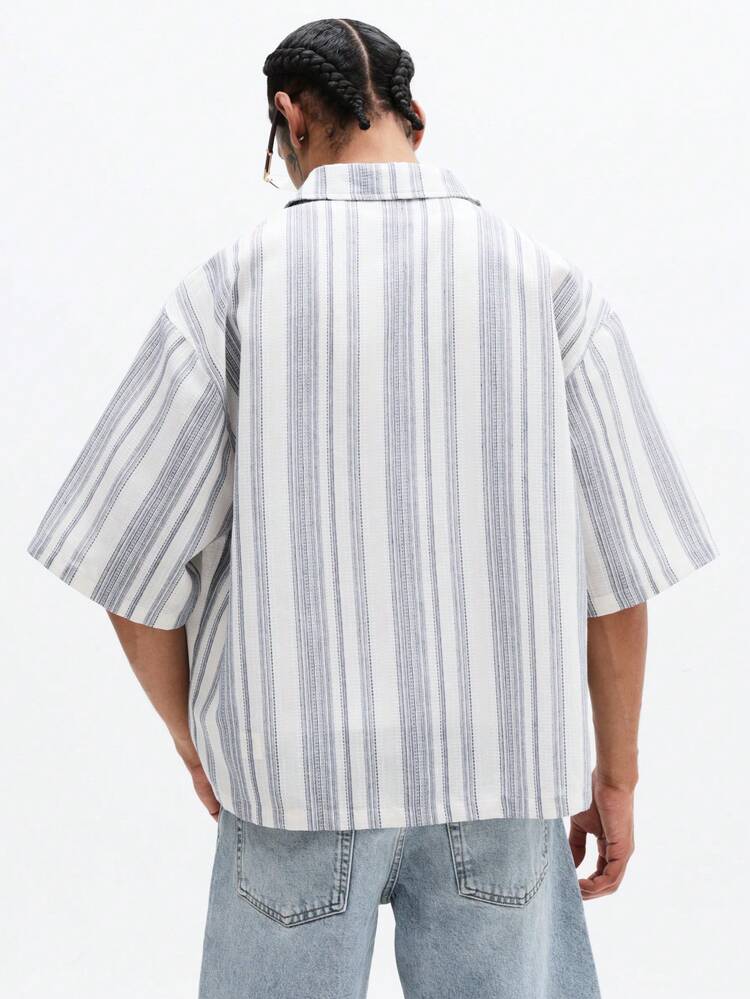 Camicia a righe a maniche corte con bottoni