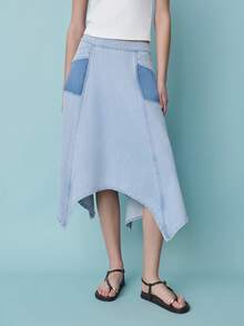 Nöista 不对称牛仔裙，饰有对比鲜明的深蓝色贴袋。休闲穿搭，适合夏季、春季和都市风格。 - 淺藍色 - 查看 1