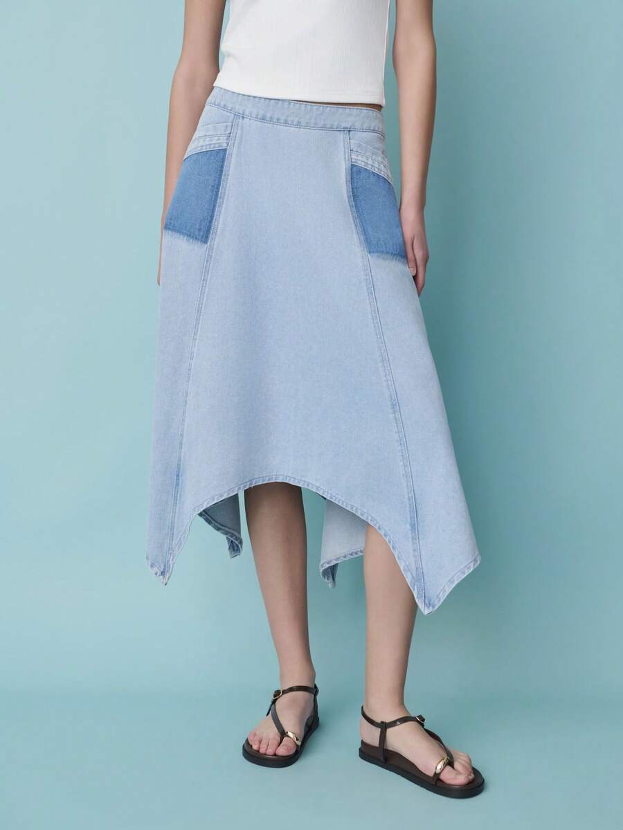 Nöista 不对称牛仔裙，饰有对比鲜明的深蓝色贴袋。休闲穿搭，适合夏季、春季和都市风格。 - 淺藍色 - 查看 1