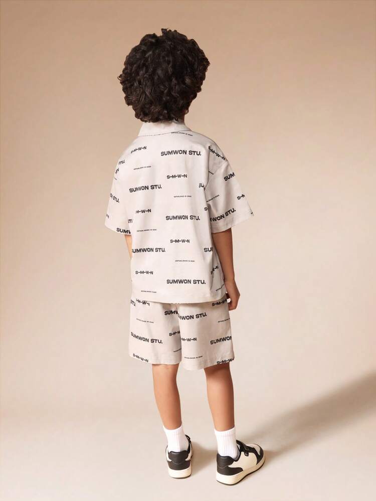 Completo camicia con bottoni e pantaloncini coordinati