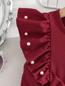 Glamorique Kids 春夏新款女童高端优雅连衣裙，酒红色纯色提花面料半裙，酒红色上衣饰以白色珍珠，无袖圆领收腰设计，适合女孩穿着，尽显高端优雅气质，适合日常、上学、外出、度假、派对、新年等场合，是优雅假日的理想之选。 - 酒紅色 - 查看 13