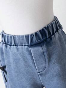 SHEIN 两件套女童夏季时尚街头休闲黑色圆领短袖T恤，胸前饰有白色蕾丝蝴蝶结印花，搭配蓝色长裤，侧边饰有黑色丝带蝴蝶结，适合街头、学校和日常穿着。 - 黑色 - 查看 7