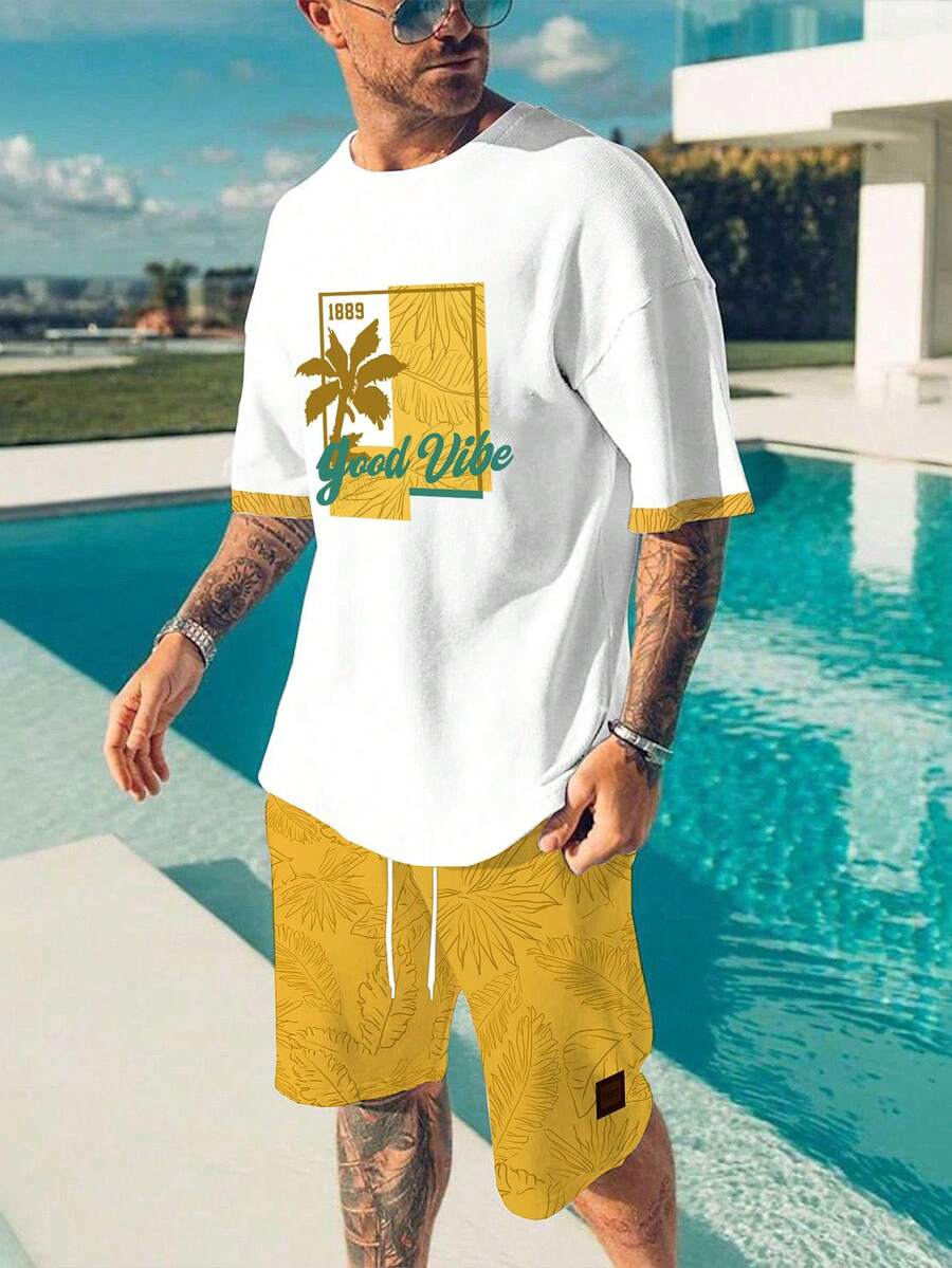 Manfinity RSRT Bộ đồ nam gồm áo thun và quần short in hình cây dừa, thích hợp cho kỳ nghỉ, trang phục thoải mái, bộ đồ nam mang đến cảm giác thư thái. - Nhiều màu - Xem 1