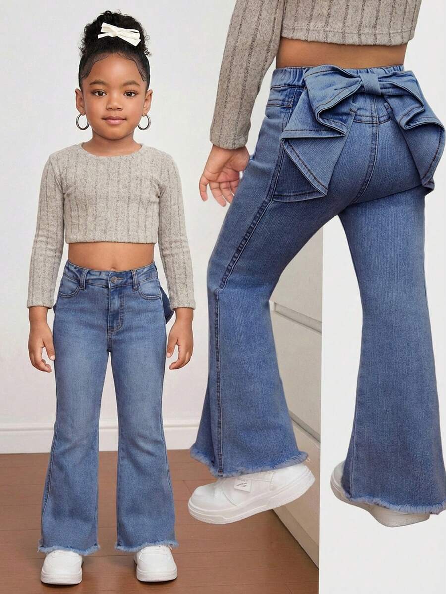 SHEIN Pantalones acampanados de mezclilla azul con cintura elástica y decoración de moño para niña - Azul lavado medio - Ver 1