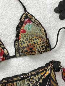 Soleia Bộ bikini đi biển cỡ lớn dành cho nữ, kiểu dáng cổ điển, họa tiết da báo, ngựa vằn, hoa lá nhiều màu sắc, có bèo nhún, buộc dây phía trước và trang trí tua rua. - màu đen - Xem 3