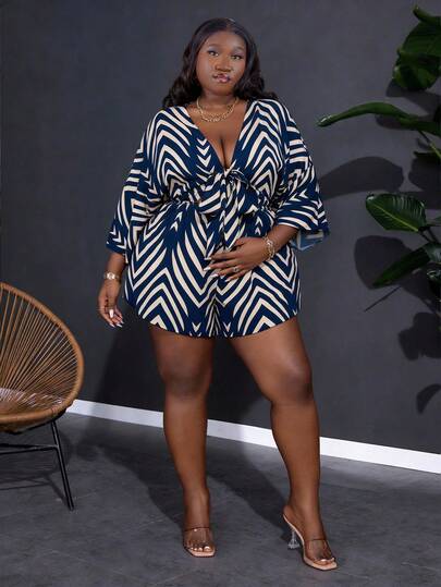 CurvyTilda 大码女式假日休闲 V 领宽松印花连体衣（配系带腰带）