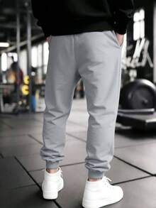 GymBeat Pantalones deportivos para hombres - Gris Claro - Ver 2