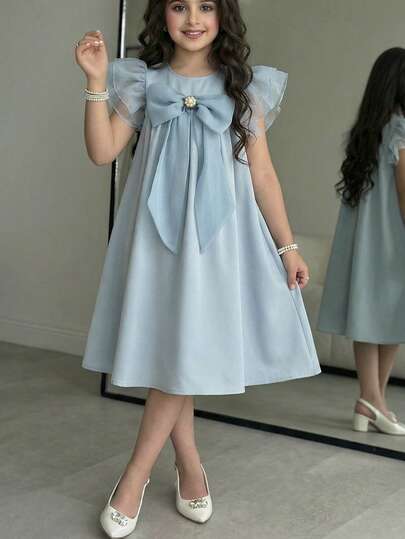 SHEIN Vestido elegante y de moda para niña preadolescente con mangas con volantes y decoración de lazo con superposición de malla