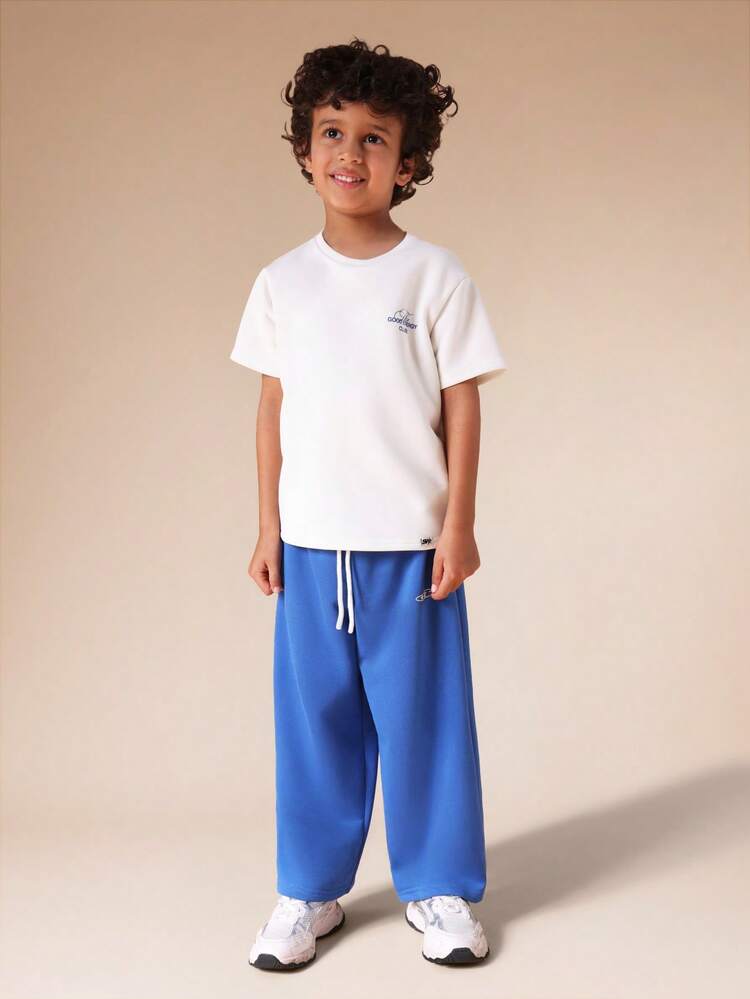 オーバーサイズグラフィックTシャツとトラックパンツのセット