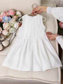 SHEIN Young Girl Woven Solid Color Round Neck Sleeveless Ruffle Hem Casual Dress Young Girl Dress Ivory Kids Dress Flower Girl Dress Sleeveless Dress White Elegant Dress,Kids - White - View 6