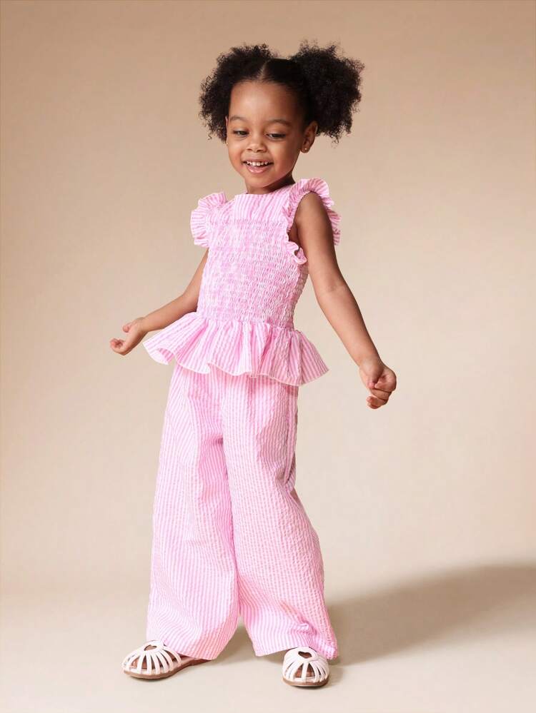 Completo canotta a righe arricciate e pantaloni a gamba larga