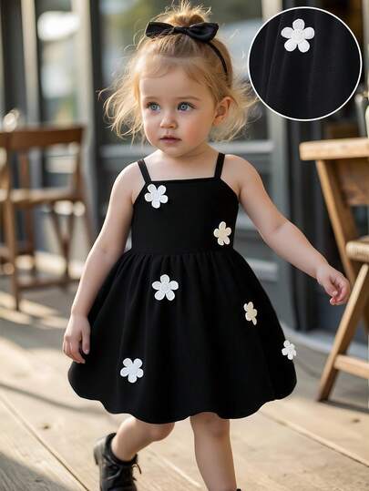 Baby Girl Black Floral Ruffle Hem Suspender Cute Dress With White 3D Flower Decor, Suitable For Casual, Elegant, Cute Occasions