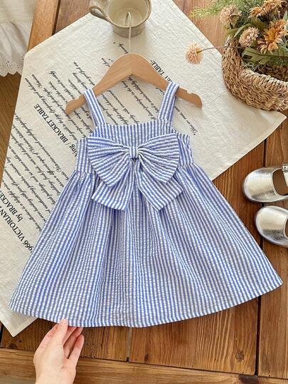  This Single-Piece SHEIN Cute Baby Girl Casual And Simple Striped Sundress With Bow Embellishment Is Suitable For Birthday Parties, Evening Parties, Performances, Weddings, Baptisms, Opening Ceremonies, Everyday Wear, School, Outings, And Spring/Summer Seasons.