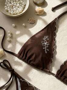 Oceva Bộ đồ bơi nữ mùa xuân/hè 2 món, bộ bikini nữ, đồ bơi màu cà phê gợi cảm và ngọt ngào với họa tiết thêu nơ, thích hợp cho kỳ nghỉ hè, bãi biển, hồ bơi, mặc hàng ngày, kỳ nghỉ biển. Bộ đồ bơi nữ mới năm 2026 phù hợp cho trường học, kỳ nghỉ, hẹn hò, trà chiều, phong cách miền Tây, du thuyền, bãi biển, đảo, du lịch đường bộ, mọi mùa, lễ hội âm nhạc, kỳ nghỉ Boho, kỳ nghỉ Bohemian, mùa thu thư giãn, phong cách Boho miền Tây, đồ bơi thanh lịch cho nữ, bộ bikini màu nâu Boho với họa tiết đầy màu sắc sống động cho kỳ nghỉ, bộ bikini kiểu Brazil với điểm nhấn quyến rũ. - Cà phê nâu - Xem 8