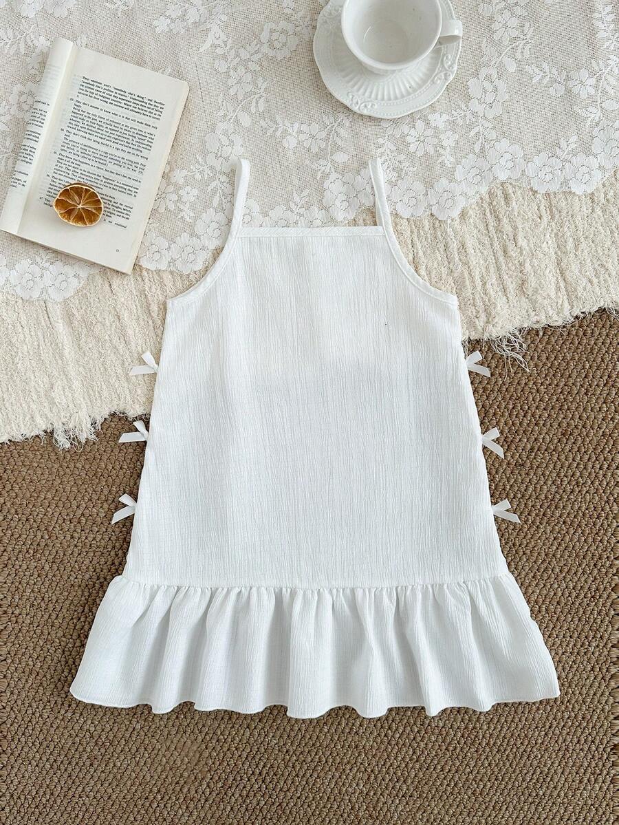 Young Girls White Textured Spaghetti Strap Dress, Pleated Soft Fabric, Ruffle Trim, Loose A-Line Silhouette, Bow Tie Accent, Sweet & Charming, Suitable For Summer Beach, Birthday Party, Princess - White - View 1