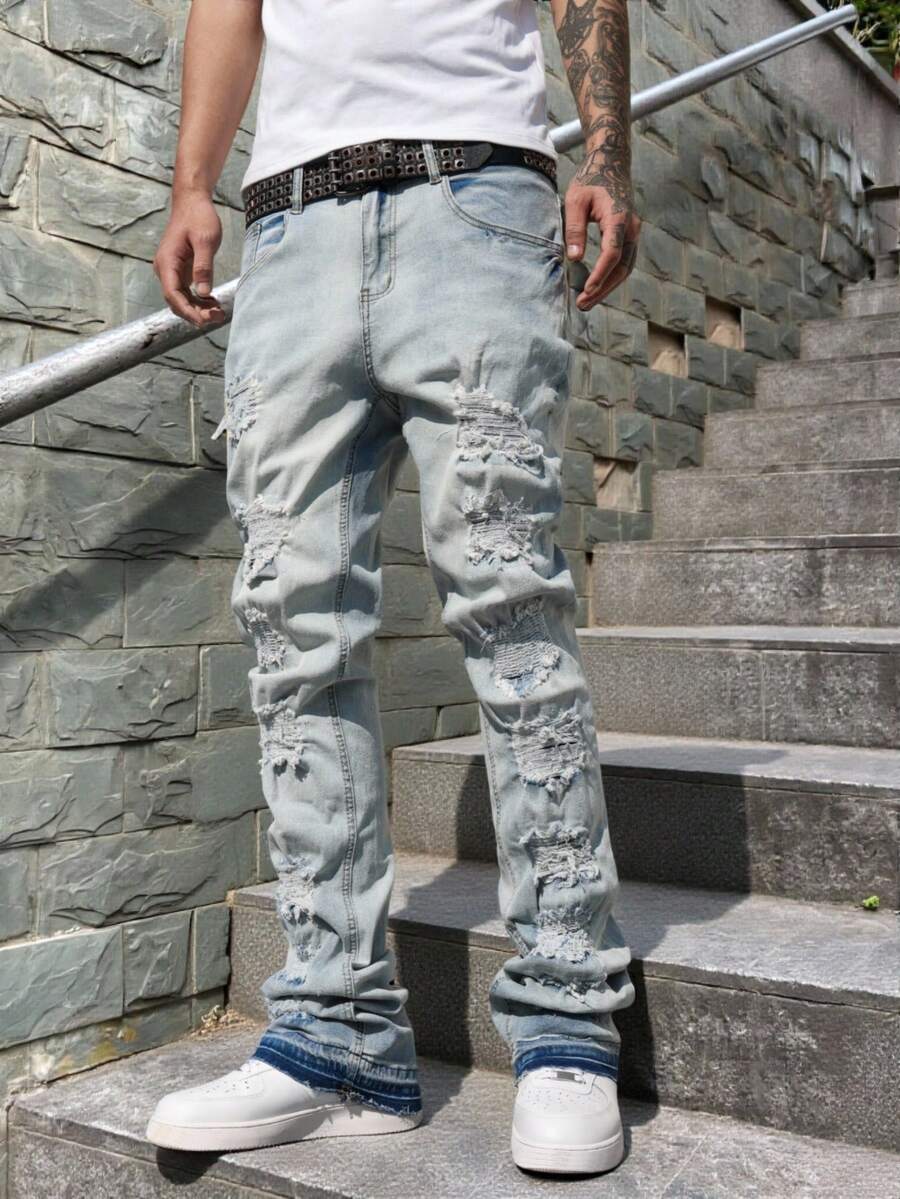 Manfinity EMRG Men's Light Blue Distressed Patch Horseshoe Slim Fit Flared Jeans Mens Ripped Jeans Streetwear Jeans - Light Wash - View 1