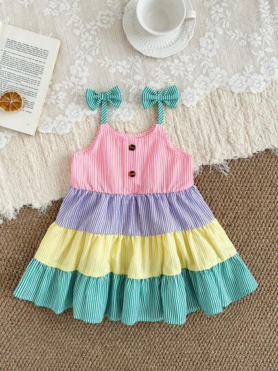 SHEIN Playful Pals Girls' Summer Vacation Striped Patchwork Spaghetti Strap Dress With Bow, Textured Fabric, Waist Cinched, Tiered Skirt, Suitable For Parties, Beach Outings