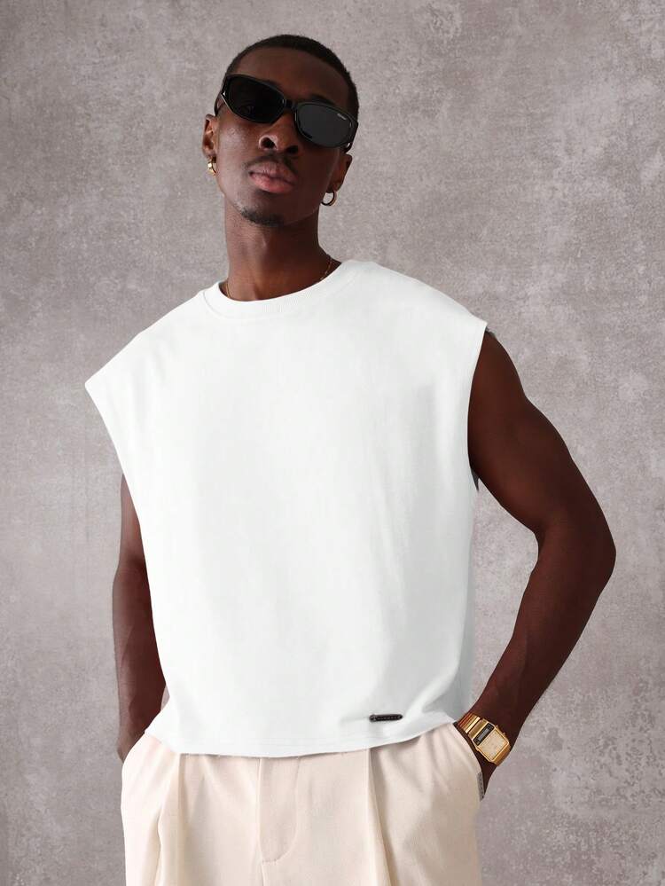 Canotta oversize da uomo con bordi grezzi e stampa grafica con slogan "Emotionally Unavailable", maglietta senza maniche con dichiarazione