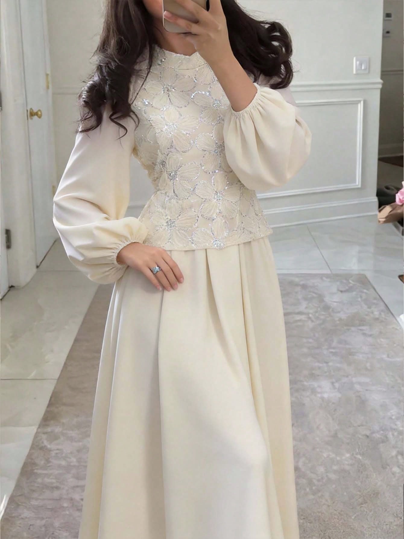 Modelyn فستان طويل الأكمام مطرز بخرز وشبكة ذو حافة...