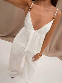 SHEIN BAE Bộ áo hai dây phối vải lanh pha, viền ren đính hạt và quần ống rộng cạp thấp có túi, thích hợp cho kỳ nghỉ ở miền Nam nước Pháp, kỳ nghỉ ở Ý, khu nghỉ dưỡng, bộ đồ vải lanh, bộ quần áo, bộ đồ đi biển, bộ đồ mùa hè. - trắng - Xem 7