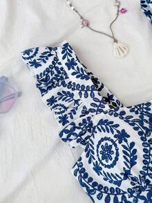 SHEIN 少女蓝白复古印花方领无袖荷叶边连体裤，露背蝴蝶镂空连体衣，适合度假、节日、午餐、音乐节等场合。 - 藍白色 - 查看 4