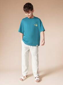 SUMWON 青色涂鸦印花T恤搭配条纹直筒裤套装，适合夏季休闲度假 - 綠色 - 查看 6