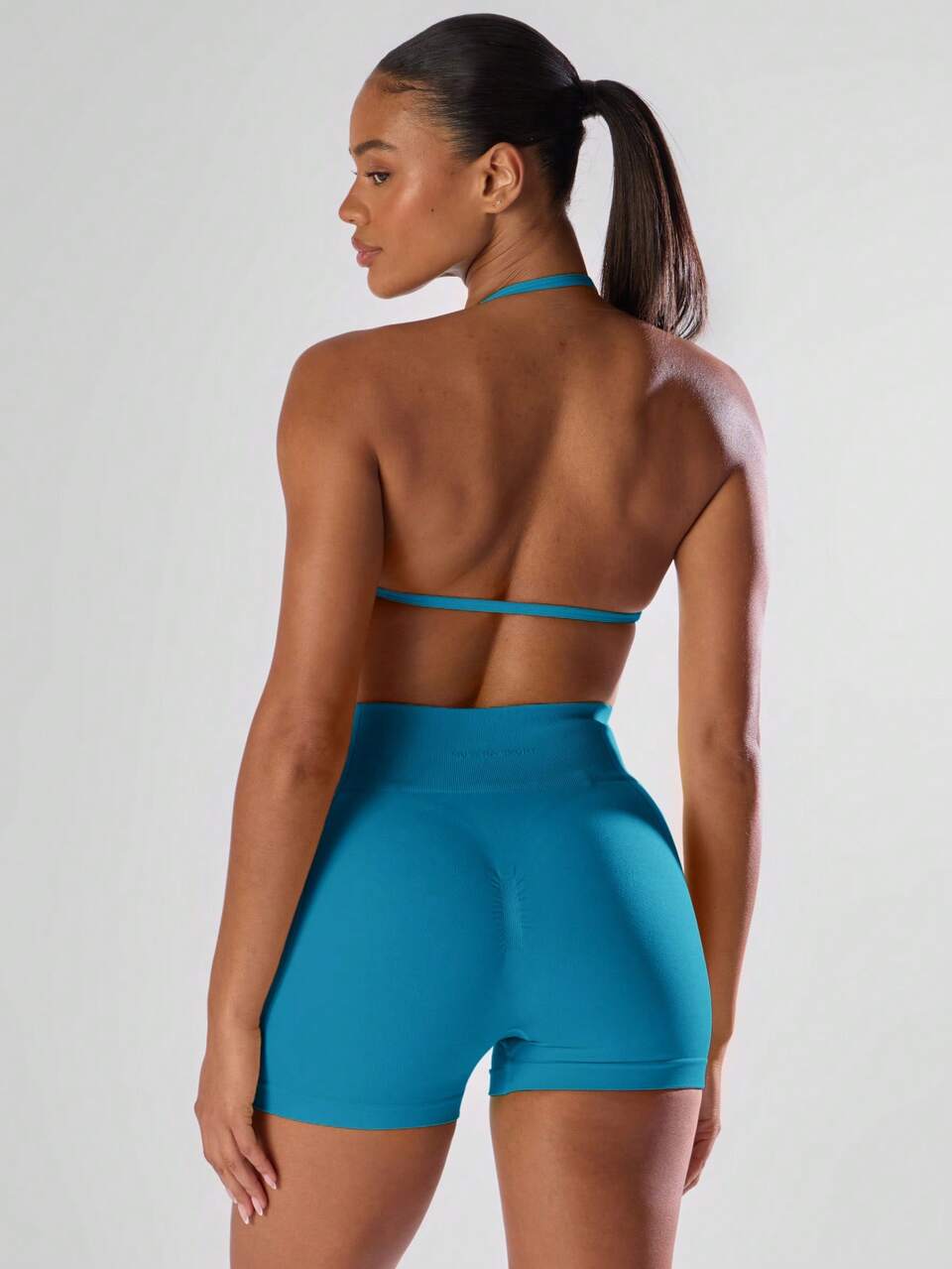 Active Blue Solid Ruched Bust Open Back Halter S Bra,