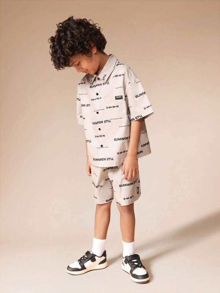 Completo camicia con bottoni e pantaloncini coordinati