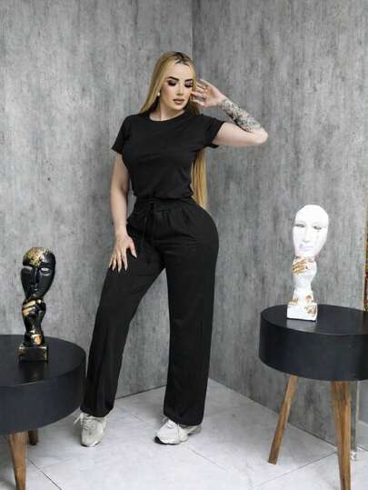 Conjunto  pantalón con línea + blusa corta 
 Tela acatalanada, cómoda