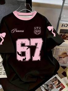 女童休闲时尚创意个性清新简约别致数字67徽章，粉色蝴蝶结，粉黑撞色，字母标语印花宽松T恤，舒适日常穿着，温暖的夏秋款式，适合春、夏、秋季穿着。 - 彩色 - 查看 7