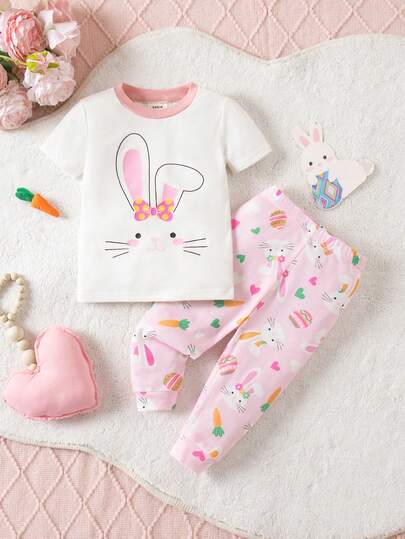SHEIN Babygirl Cute Casual Fitted Cartoon Pattern Colorblock Short Sleeve Pajama Set Cute Cartoon Easter Baby Girl Loungewear, A Festive Dress, Pink Snug Fit Pajama Set With Adorable Bunny Print Cute Easter Bunny Pattern, Perfect For A Baby Girl's Tight-Fitting Pajama Set. Soft Loungewear Suitable For Babies