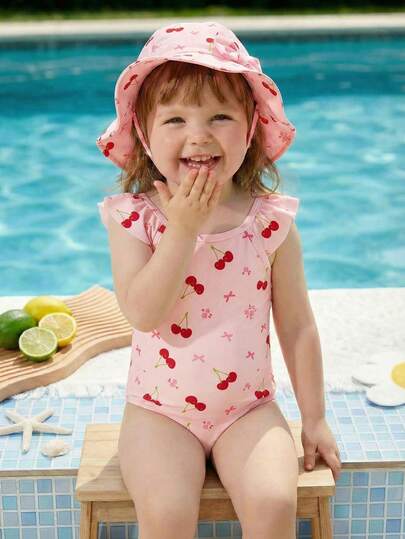 SHEIN Traje de baño de una pieza ajustado, de estilo minimalista casual para niñas bebé, con estampado de lazo y flores de cerezo en color crema, dulce y lindo, adecuado para el verano