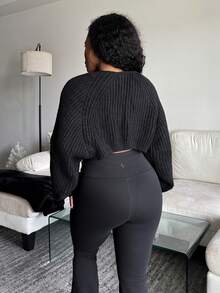 Tyla Gomez Cárdigan de mujer negro casual de 1 pieza con mangas de murciélago acanaladas, tops de manga larga en otoño/invierno - Negro - Ver 2
