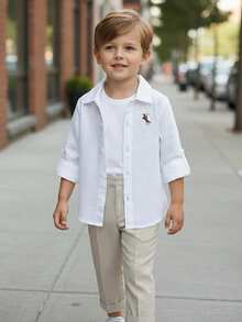 1pc Toddler Boys' Gentleman Style White Textured Long Sleeve Button-Up Shirt, Woven Cotton Bamboo Fiber Textured Fabric, Classic Collar Design, 5 White Buttons On Front, Left Chest Embroidered Polo Player Logo, Suitable For Casual, Holiday, Outing, Can Be Paired With Suit Jacket And Trousers - White - View 1