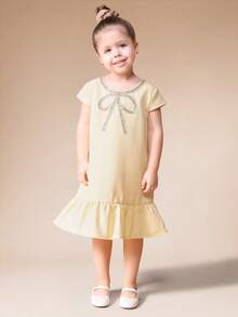 SUMWON Girls Short Sleeve Bow Detail Drop Waist Ruffle Hem Mini Dress With Embellished Neckline For Special Occasions For Casual And Vacation - Yellow - View 1
