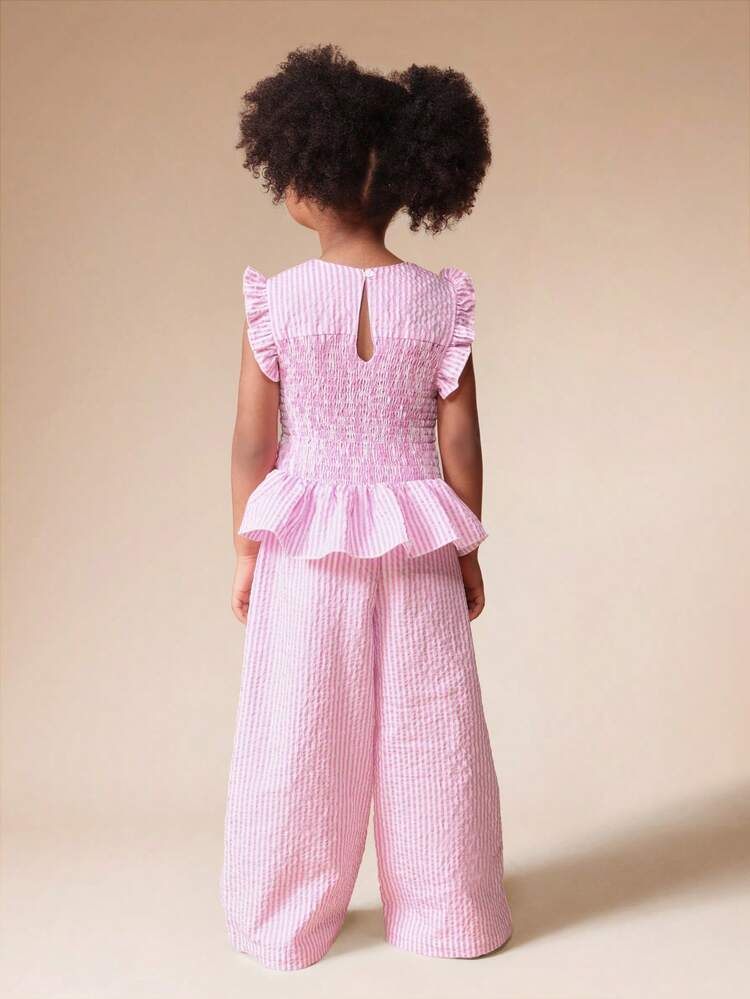 Completo canotta a righe arricciate e pantaloni a gamba larga