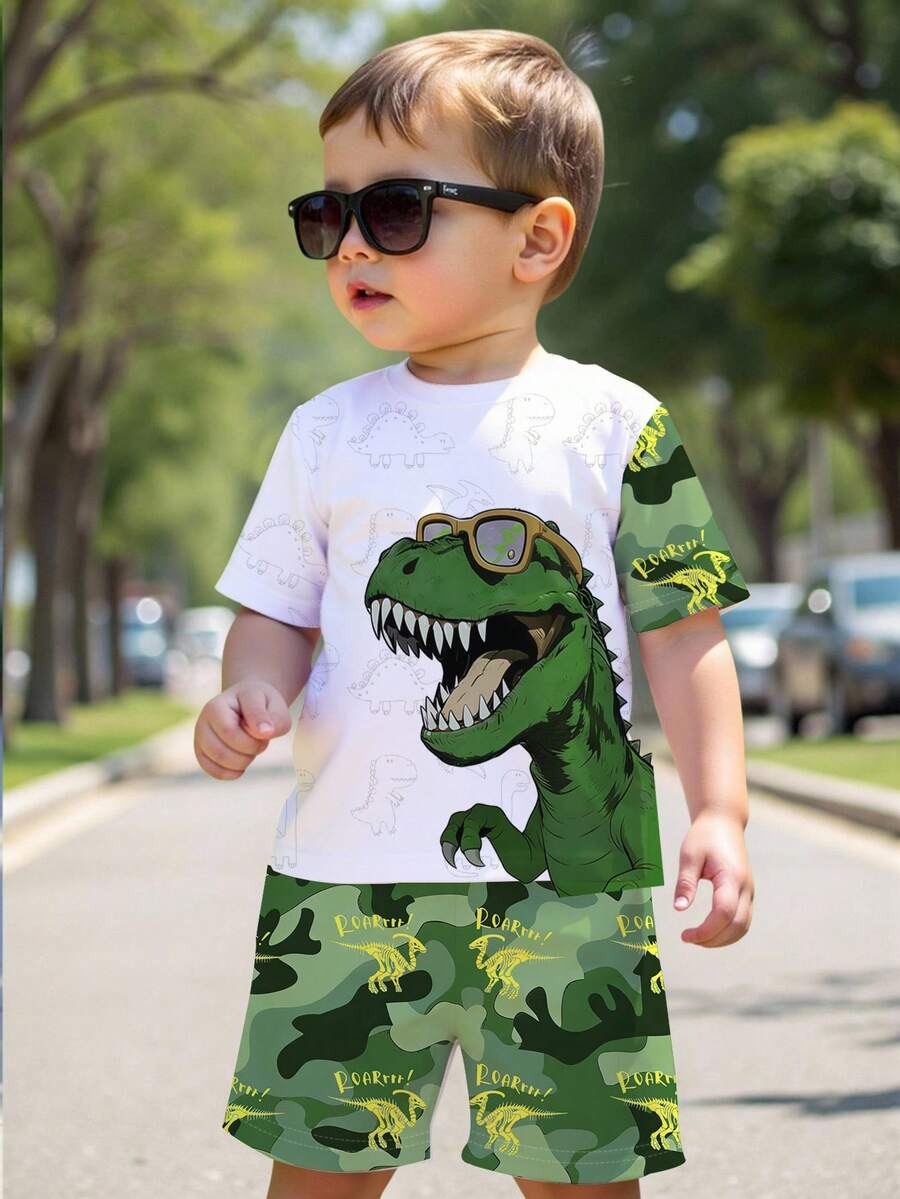 SHEIN Explorewe 一套幼儿可爱白色绿色恐龙印花短袖短裤套装，非抓绒材质。适合日常玩耍，春夏皆宜的可爱之选。