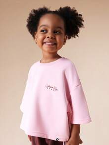 SUMWON Conjunto de camiseta de manga corta oversize y pantalones anchos de chándal con estampado de texto y detalles de rayas en contraste para niñas, casual para vacaciones - Rosa Pálido - Ver 3