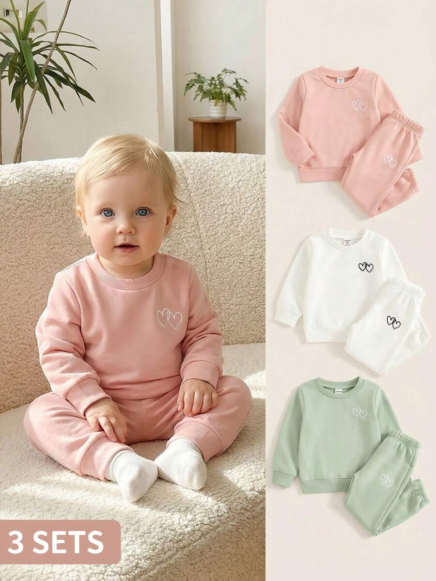 SHEIN 3pcs Baby Girls' Casual Comfortable Loose Fit Heart Print Long Sleeve Knit Sweatshirt + Loose Knit Pants Outfit Set, Autumn/Winter - Multicolor - View 1